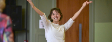 lady with her hands up