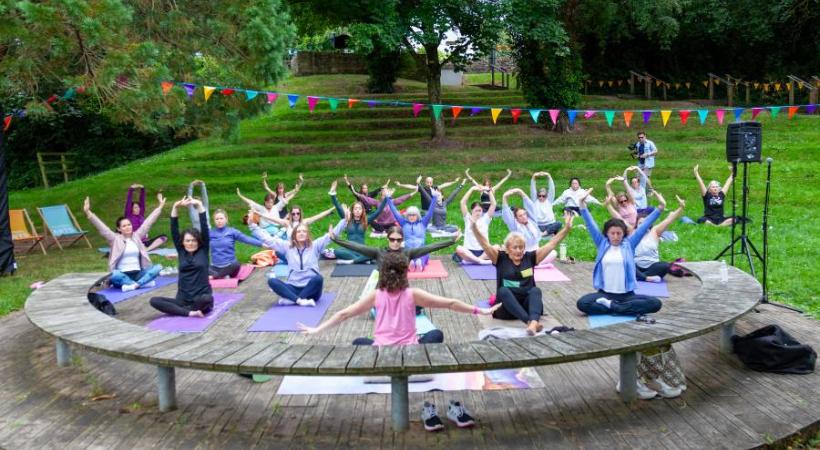 Image of people doing yoga