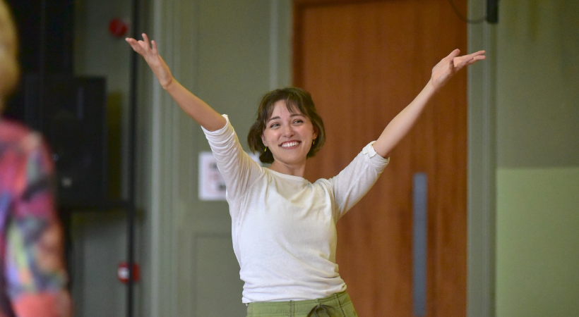 lady with her hands up